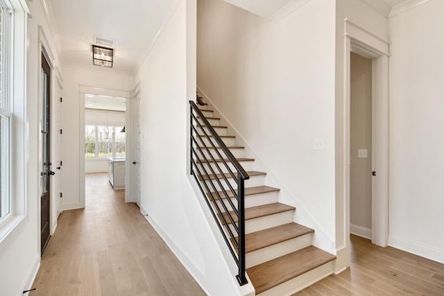 520 Valley Forge Ln, Rossville, TN 38066 - stairway featuring wood finished floors, baseboards, and crown molding