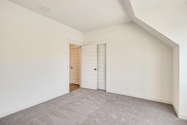 520 Valley Forge Ln, Rossville, TN 38066 - unfurnished bedroom with carpet, vaulted ceiling, and baseboards