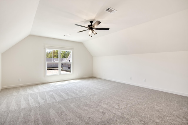 520 Valley Forge Ln, Rossville, TN 38066 - additional living space featuring light carpet, vaulted ceiling, baseboards, and ceiling fan