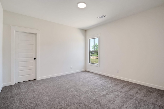 spare room with carpet flooring