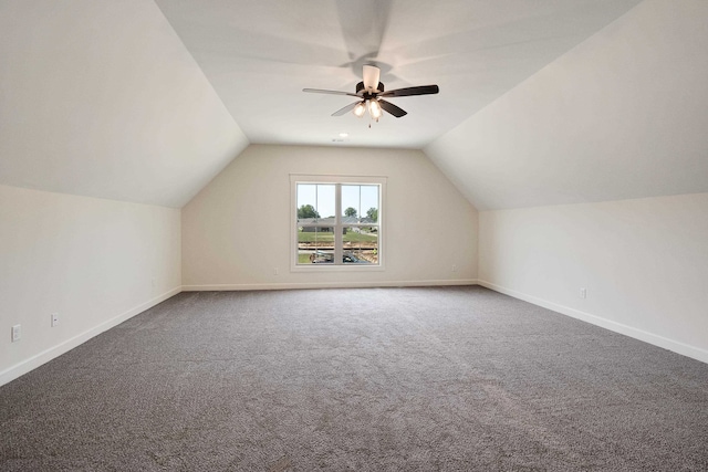 bonus room with ceiling fan, carpet floors, and vaulted ceiling