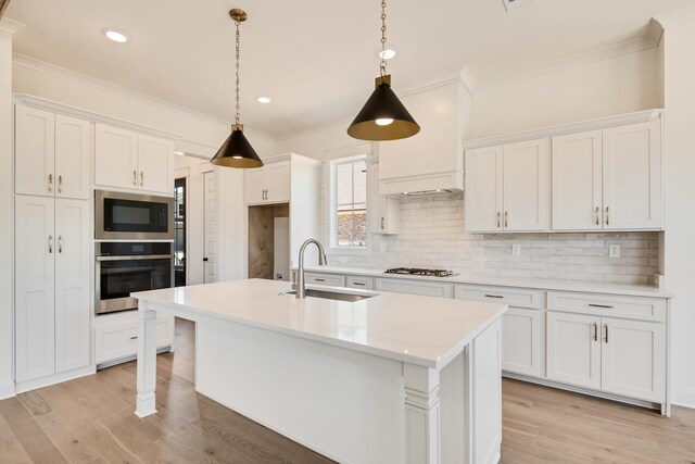 520 Valley Forge Ln, Rossville, TN 38066 - kitchen with stainless steel appliances, ornamental molding, a sink, backsplash, and white cabinetry