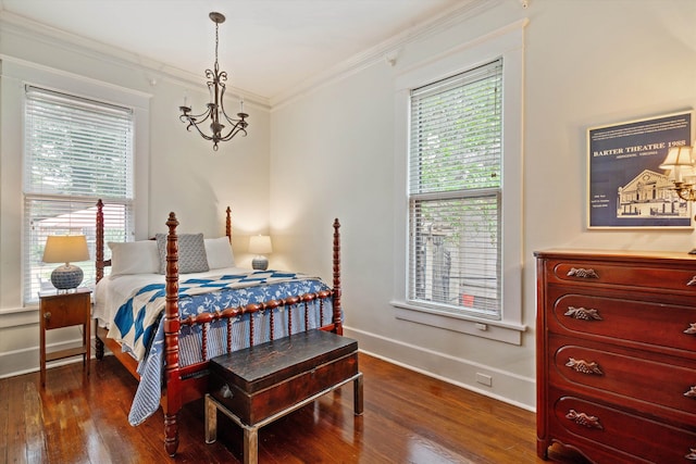 bedroom featuring crown molding and dark wood-type flooring