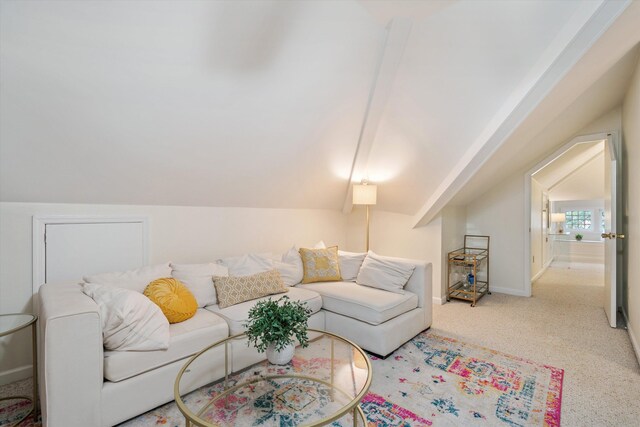 1876 Cowden Ave, Memphis, TN 38104 - carpeted living room featuring vaulted ceiling