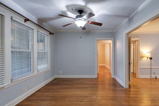 spare room with ceiling fan, hardwood / wood-style floors, and ornamental molding