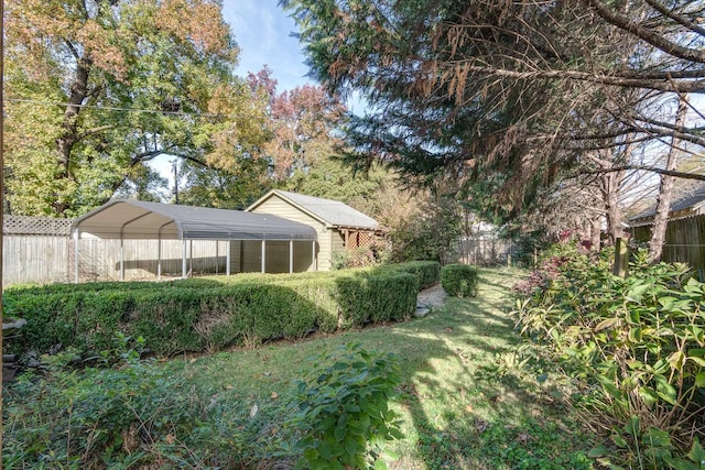 view of yard featuring a carport