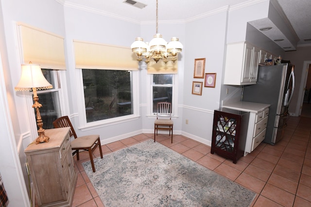 living area featuring a chandelier, light tile patterned floors, and crown molding