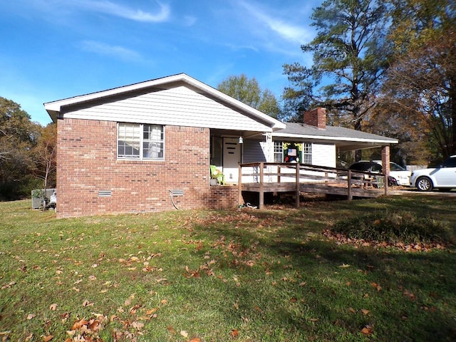 view of front facade with a front lawn