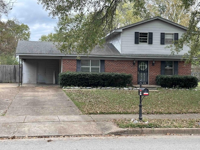 front facade featuring a carport