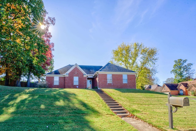 view of front of house with a front lawn