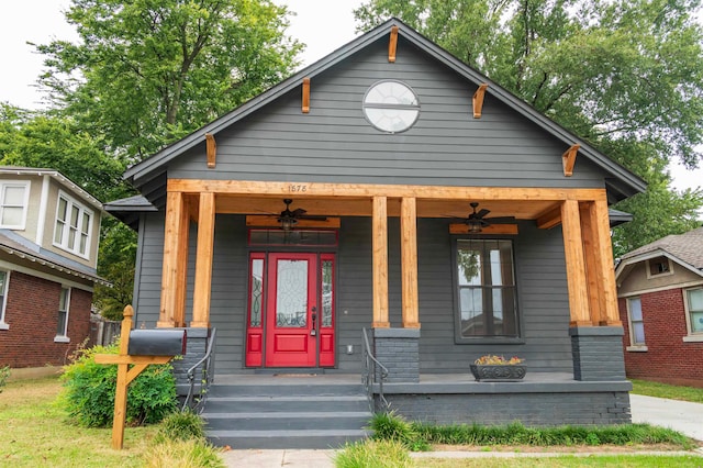 bungalow-style home with ceiling fan and a porch