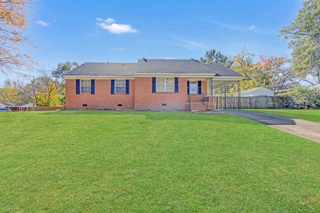 ranch-style home with a front yard