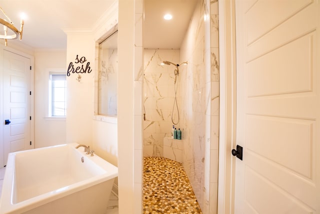 bathroom featuring crown molding and shower with separate bathtub