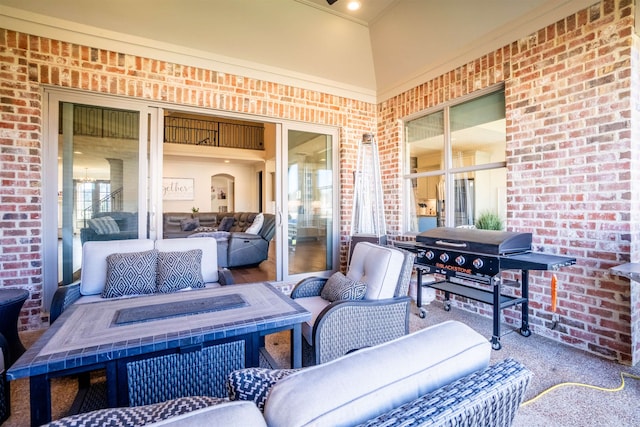 view of patio with an outdoor living space and area for grilling