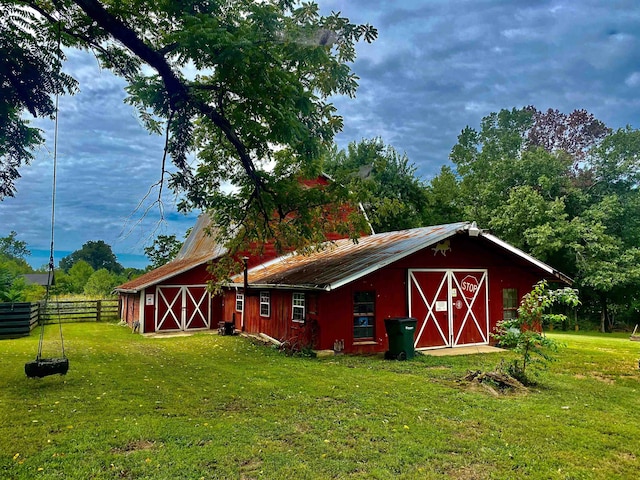 view of outdoor structure with a yard