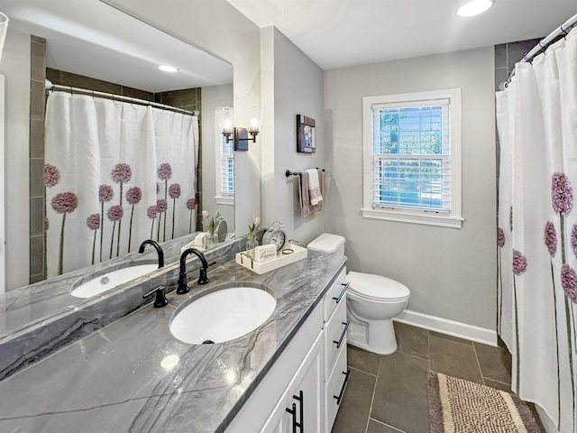 bathroom with tile patterned flooring, vanity, toilet, and a shower with shower curtain