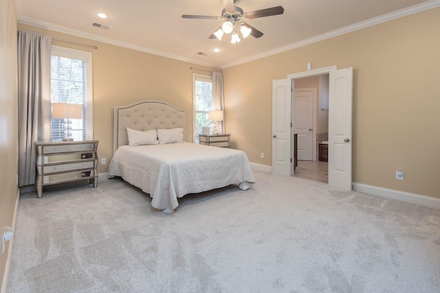 carpeted bedroom with ceiling fan and crown molding