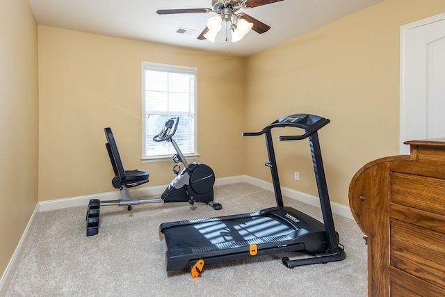 workout area with carpet flooring and ceiling fan