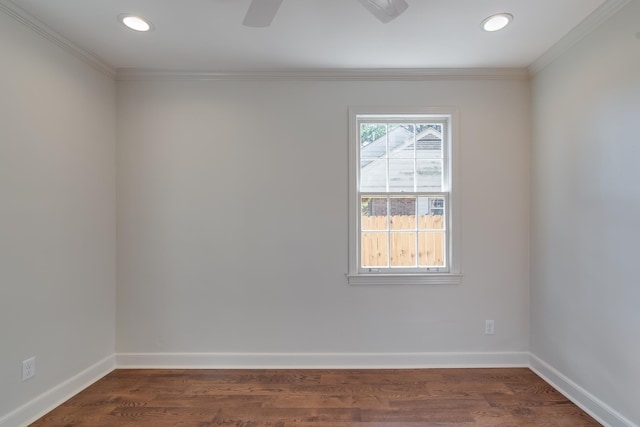 spare room with ceiling fan, dark hardwood / wood-style floors, and ornamental molding