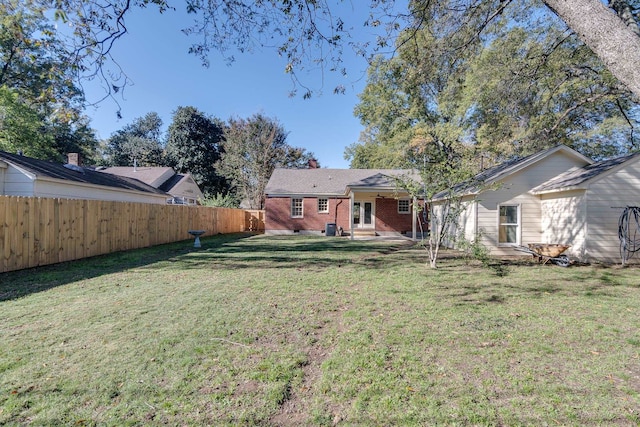 view of yard featuring central AC