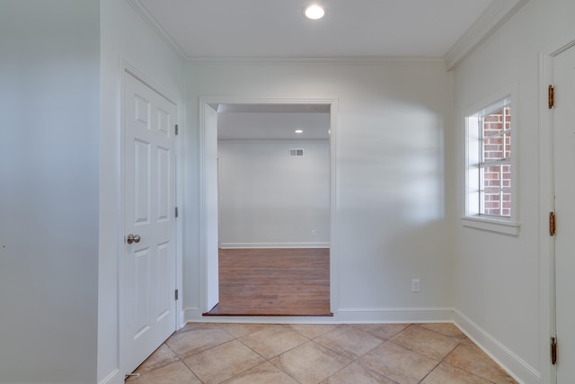 interior space featuring light hardwood / wood-style flooring and ornamental molding