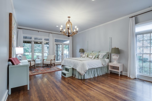 bedroom with french doors, dark hardwood / wood-style flooring, an inviting chandelier, and ornamental molding