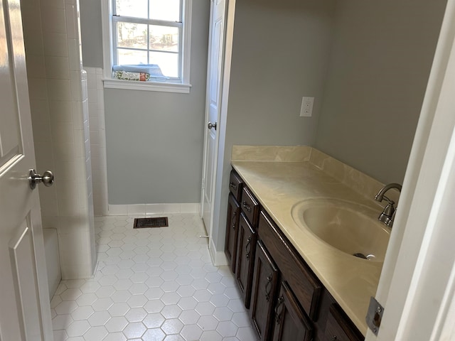 bathroom featuring vanity and tile patterned floors