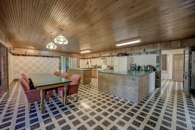 kitchen with hanging light fixtures, white fridge with ice dispenser, and wooden ceiling