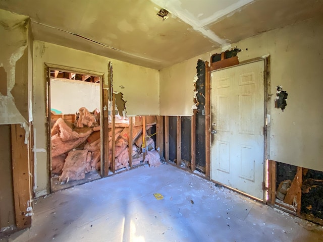 miscellaneous room with concrete flooring