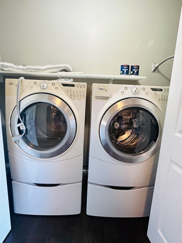 washroom with washer and dryer