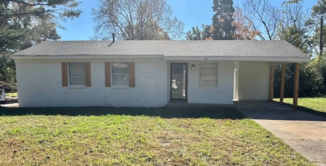 single story home featuring a front yard and a carport