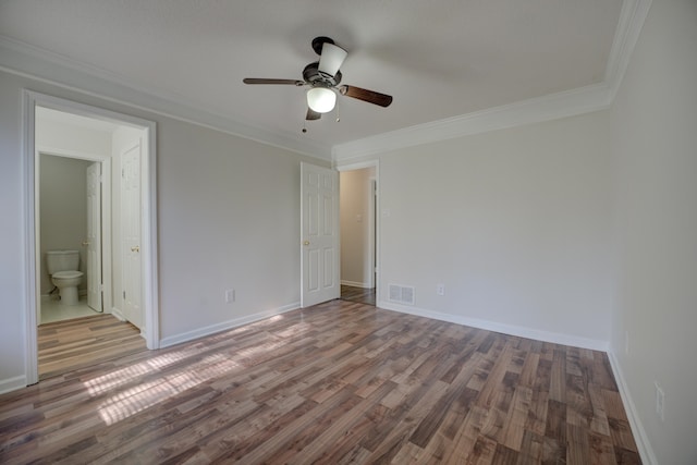 unfurnished bedroom featuring crown molding, ceiling fan, ensuite bathroom, and wood-type flooring