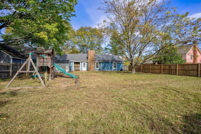 view of yard featuring a playground