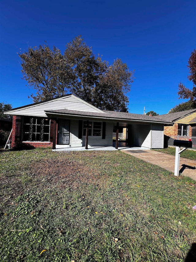 single story home featuring a patio and a front lawn