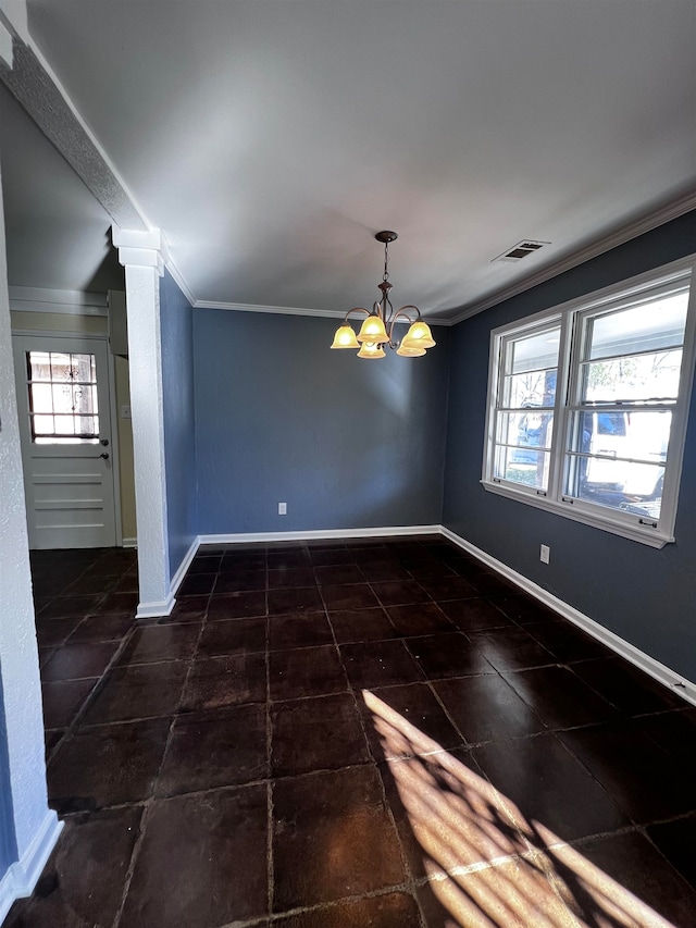 unfurnished dining area with ornamental molding and a chandelier