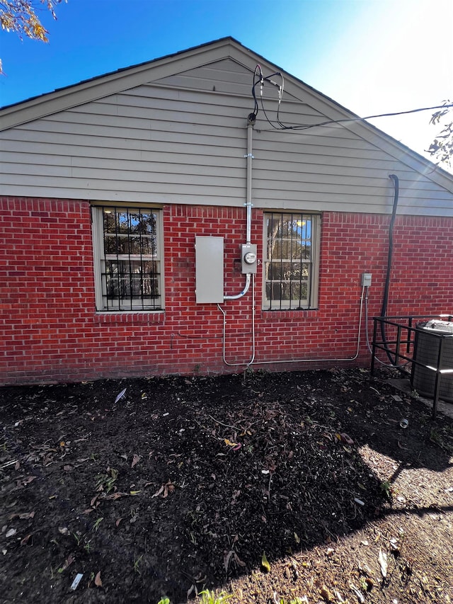 view of property exterior with cooling unit