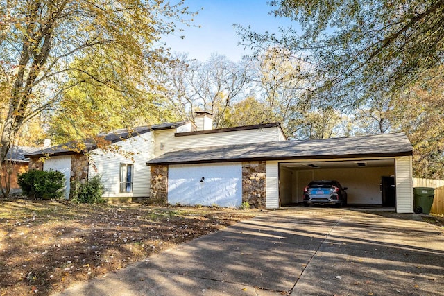 view of side of property featuring a carport