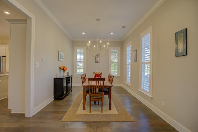 dining area featuring a notable chandelier, crown molding, and dark wood-type flooring