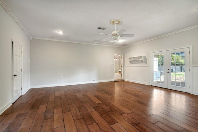 spare room with ceiling fan, dark hardwood / wood-style flooring, crown molding, and french doors