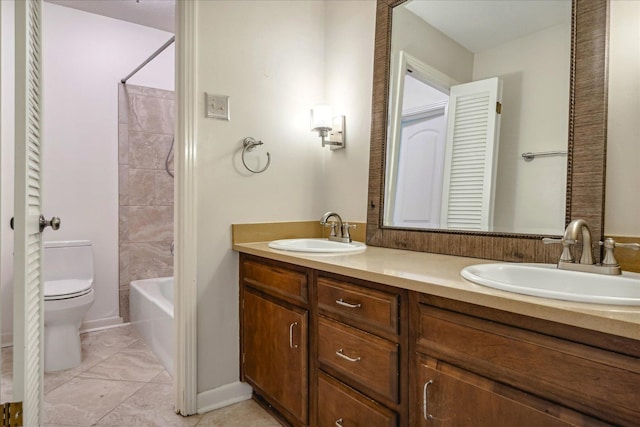 full bathroom with tile patterned flooring, vanity, toilet, and shower / tub combination