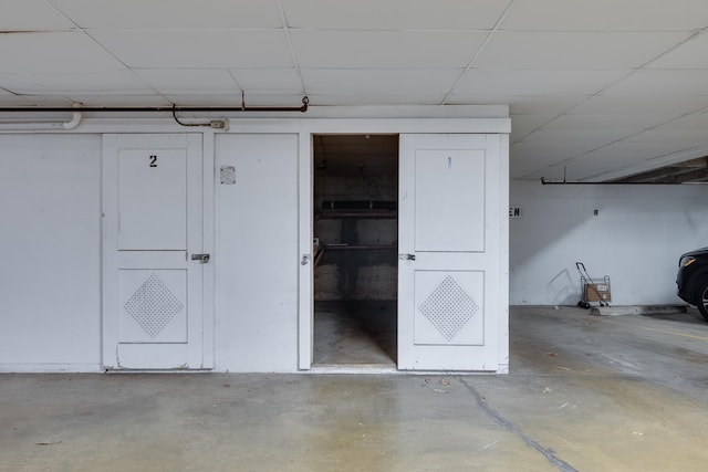 interior space featuring a drop ceiling