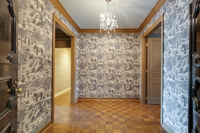 hallway with parquet floors, crown molding, and a chandelier