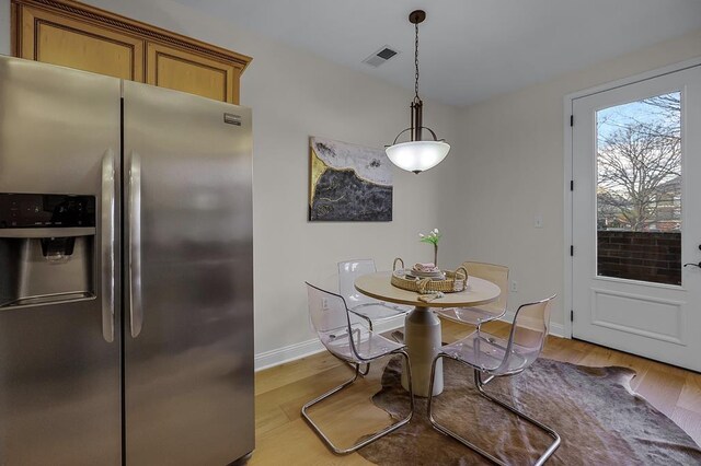 57 W Georgia Ave W Unit 102, Memphis, TN 38103 - dining area featuring baseboards and light wood-style floors
