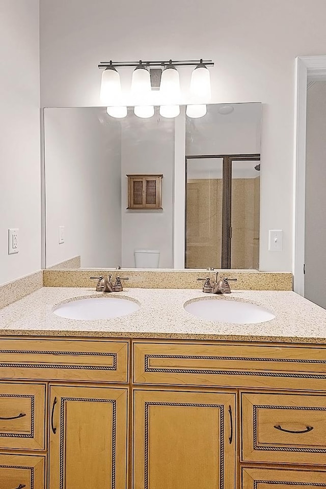 57 W Georgia Ave W Unit 102, Memphis, TN 38103 - bathroom featuring double vanity and a stall shower