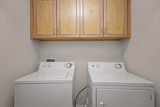 57 W Georgia Ave W Unit 102, Memphis, TN 38103 - laundry area with washer and clothes dryer and cabinet space