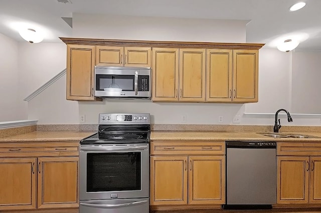 kitchen with appliances with stainless steel finishes and sink