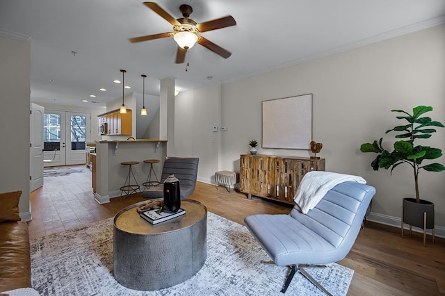 57 W Georgia Ave W Unit 102, Memphis, TN 38103 - living area featuring wood finished floors, a ceiling fan, recessed lighting, and ornamental molding