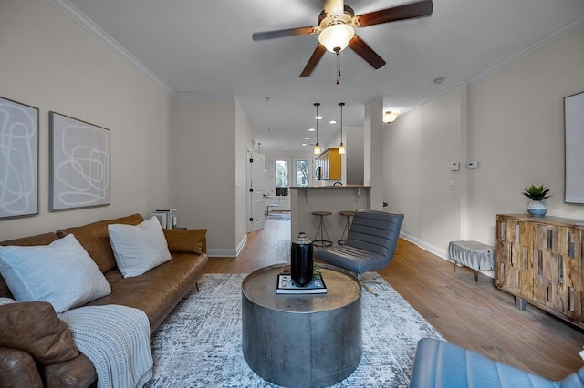 57 W Georgia Ave W Unit 102, Memphis, TN 38103 - living room featuring a ceiling fan, wood finished floors, crown molding, and recessed lighting