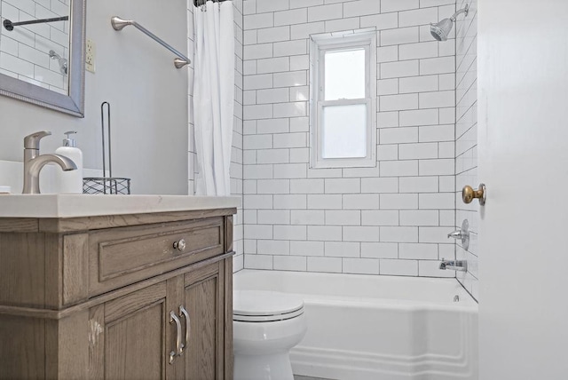 full bathroom featuring vanity, shower / bathtub combination with curtain, and toilet