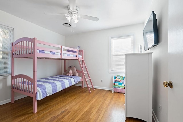 bedroom featuring ceiling fan and hardwood / wood-style floors